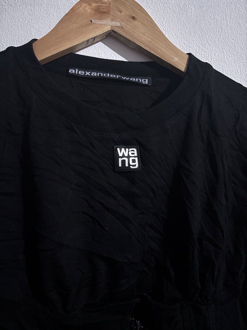 Alexander Wang Black Cropped T-Shirt (Category: Shirts) located in Naga. Submitted by ajrc.shop (Listing ID 1464501599, Image 3). Description: Alexander Wang Zipper Tee ✅Size: S ✅Width: 15 ✅Length: 17 ✅Color Rate: 9/10 ✅Issue: None ✅Need Wash ✅Location: Bicol Naga City, Camarines Sur ✅Courier: J&T Express/Flash Express ✅MOP: Gcash only.