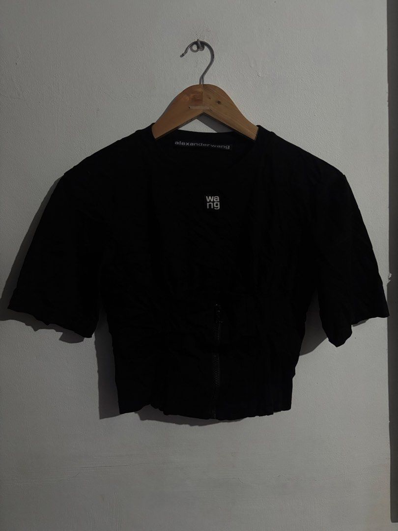 Alexander Wang Black Cropped T-Shirt (Category: Shirts) located in Naga. Submitted by ajrc.shop (Listing ID 1464501599, Image 1). Description: Alexander Wang Zipper Tee ✅Size: S ✅Width: 15 ✅Length: 17 ✅Color Rate: 9/10 ✅Issue: None ✅Need Wash ✅Location: Bicol Naga City, Camarines Sur ✅Courier: J&T Express/Flash Express ✅MOP: Gcash only.