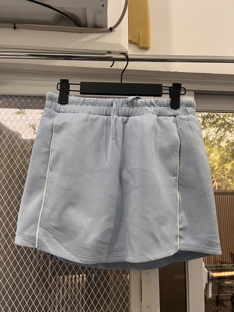 All in Motion Light Blue Athletic Skort XL (Category: Skirts) located in Antipolo. Submitted by prensy (Listing ID 1464496698, Image 1). Description: - Actual color is periwinkle - Elastic waistband with drawstring for a secure fit - Built-in shorts for added comfort and coverage - Stylish white piping detail on the sides - Versatile for sports activities or everyday casual wear - Crafted from a blend of recycled polyester and spandex - Brand new