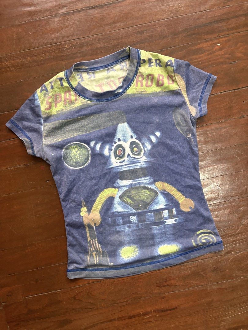All-over-print Graphic Top (Category: Shirts) located in Manila. Submitted by da.rrel.real (Listing ID 1464441861, Image 2). Description: ⋆˚꩜｡ details ⋆˚꩜｡ best fits : xs-small issues : none color rate : 9/10 .✦ ݁˖ rules .✦ ݁˖ * no return / refund / exchange * you ask for more photos if you're SURE BUYER * shipping fee is shouldered by buyers unless stated otherwise (loc: Baguio City) love, darrel 𝜗𝜚⋆₊˚ .