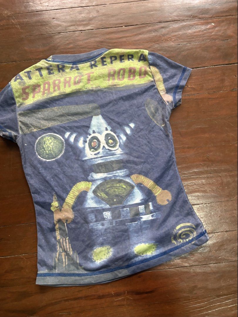 All-over-print Graphic Top (Category: Shirts) located in Manila. Submitted by da.rrel.real (Listing ID 1464441861, Image 3). Description: ⋆˚꩜｡ details ⋆˚꩜｡ best fits : xs-small issues : none color rate : 9/10 .✦ ݁˖ rules .✦ ݁˖ * no return / refund / exchange * you ask for more photos if you're SURE BUYER * shipping fee is shouldered by buyers unless stated otherwise (loc: Baguio City) love, darrel 𝜗𝜚⋆₊˚ .