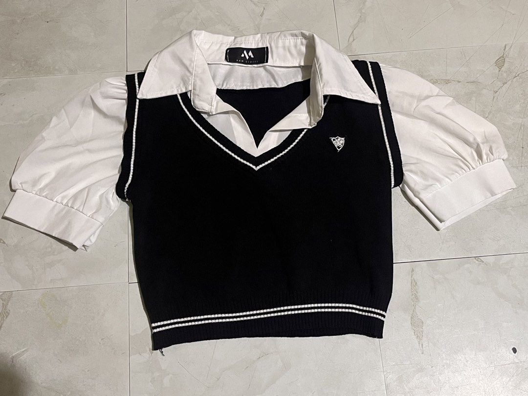 A&M CLOSET Black & White Collared Puff Sleeve Top (Category: Blouses) located in Valenzuela. Submitted by saebiii01 (Listing ID 1464462595, Image 1). Description: has a minimal stain on the back sleeve.