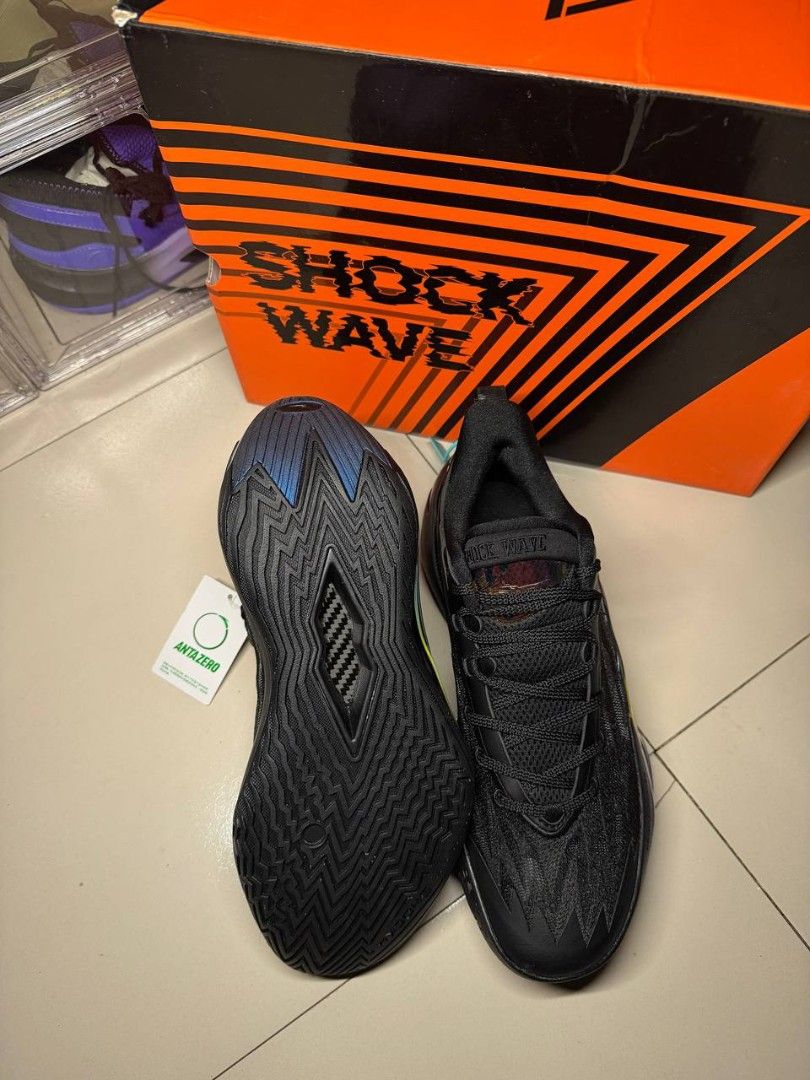 Anta Shock Wave Basketball Shoes (Category: Sneakers) located in Davao. Submitted by jgornez1539244 (Listing ID 1464555939, Image 3). Description: - Black Anta Shock Wave basketball shoes - Features a striking iridescent flame design on the side - Unique tread pattern on the sole for superior grip - Includes original box - Ideal for both basketball performance and everyday casual style.