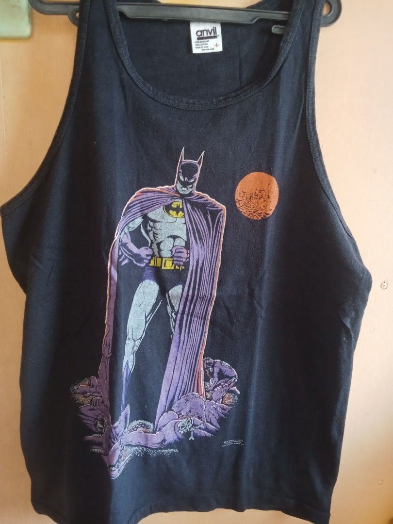 Anvil Batman Graphic Tank Top Size L (Category: Tshirts & Polo Shirts ) located in Bacolod City. Submitted by vaststar.8be4bd (Listing ID 1464420071, Image 1). Description: - Black Anvil tank top with a cool Batman graphic print. - Made of 100% pre-shrunk cotton for lasting comfort. - Measurements: 20 inches wide, 28 inches long. - Perfect for any Batman enthusiast! - Easy care: Machine wash warm with like colors..