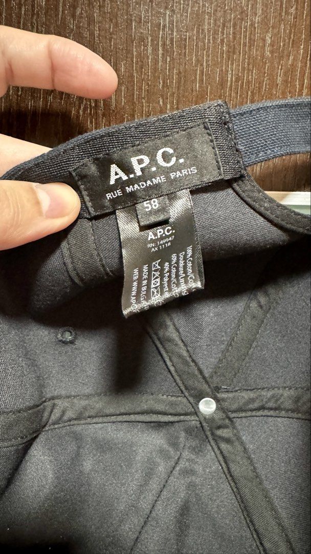 A.P.C. Rue Madame Paris Cap Size 58 (Category: Caps & Hats) located in Mandaluyong City. Submitted by noms11 (Listing ID 1464464700, Image 3). Description: - Navy blue A.P.C. Rue Madame Paris cap - Size: 58 - Features A.P.C. logo on front patch - Adjustable strap at the back for a custom fit - Material: Cotton blend - Made in Vietnam.