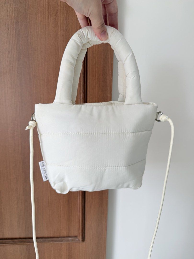 APIVITA Puffer Tote Bag - White (Category: Tote Bags) located in Baguio. Submitted by p-finds (Listing ID 1464385428, Image 3). Description: - Cute white puffer tote bag - Versatile with top handle and long strap - Secure magnetic snap closure - Small size.