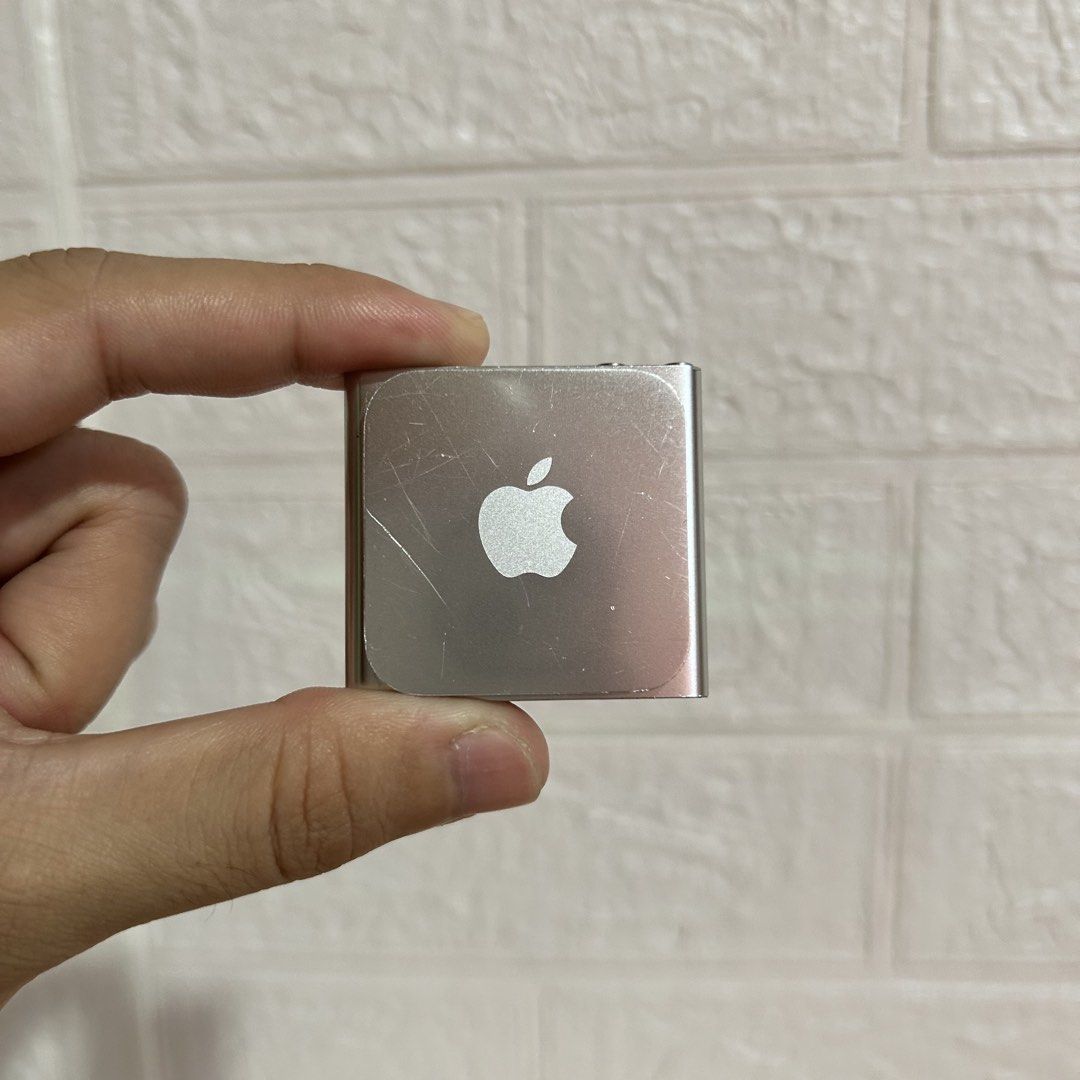 Apple iPod Nano 6th Gen (8GB, Silver) (Category: Portable Music Players) located in Manila. Submitted by ch4rli3_02 (Listing ID 1464465706, Image 2). Description: Apple iPod Nano 6th Gen ₱4,000 (FIXED PRICE) Physical Condition: Newly replaced battery (brand new). Has visible scratches on the body and screen. • 8GB Storage • Loaded with songs for testing • Touch and all buttons working perfectly Inclusions: • Unit • 30 Pin Cable Payment Method: • 