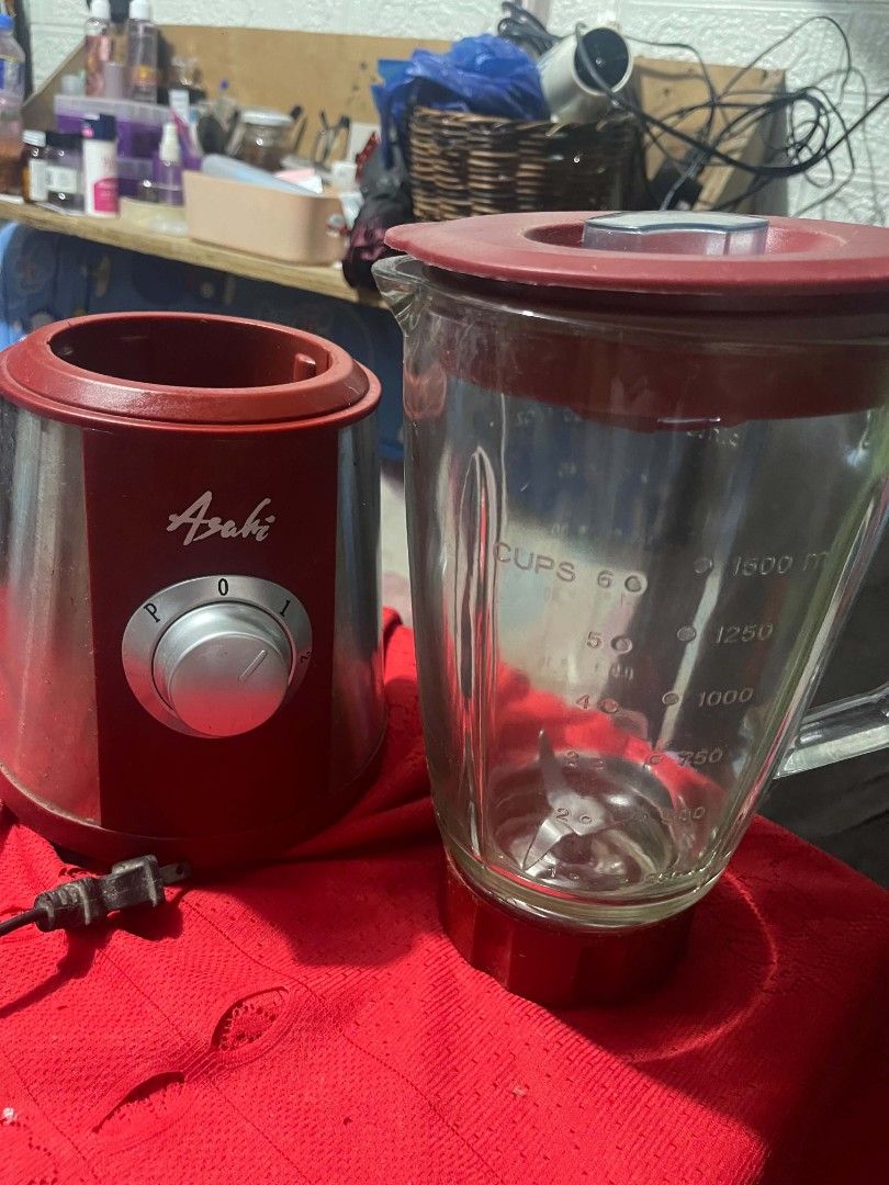 Asahi Blender with Glass Jar (Category: Juicers, Blenders & Grinders) located in Digos. Submitted by coolwind.b4ea13 (Listing ID 1464387873, Image 1). Description: - Asahi Blender - Durable glass jar and lid - Stylish red base with silver accent - Multiple speed settings: P, 0, 1, 2 - Power cord included - Ideal for smoothies, sauces, and more!.