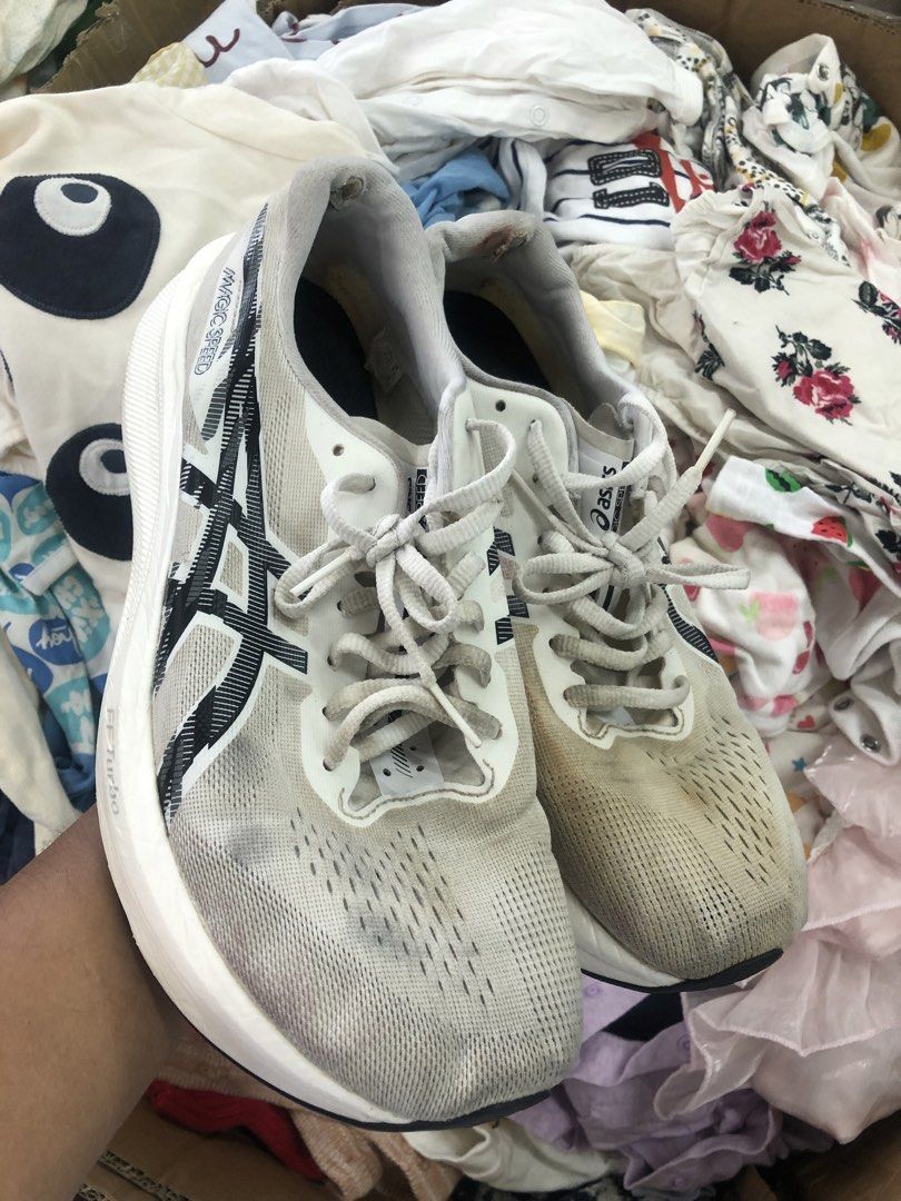 ASICS Magic Speed 4 Turbo Running Shoes (Category: Sneakers) located in Cavite. Submitted by thriftkicks3 (Listing ID 1464463501, Image 2). Description: - ASICS Magic Speed FF Turbo running shoes - Color: White and Black - Lightweight and responsive design - Features some signs of wear on mesh and soles - Plenty of life left for training or casual wear - Ideal for your next workout.