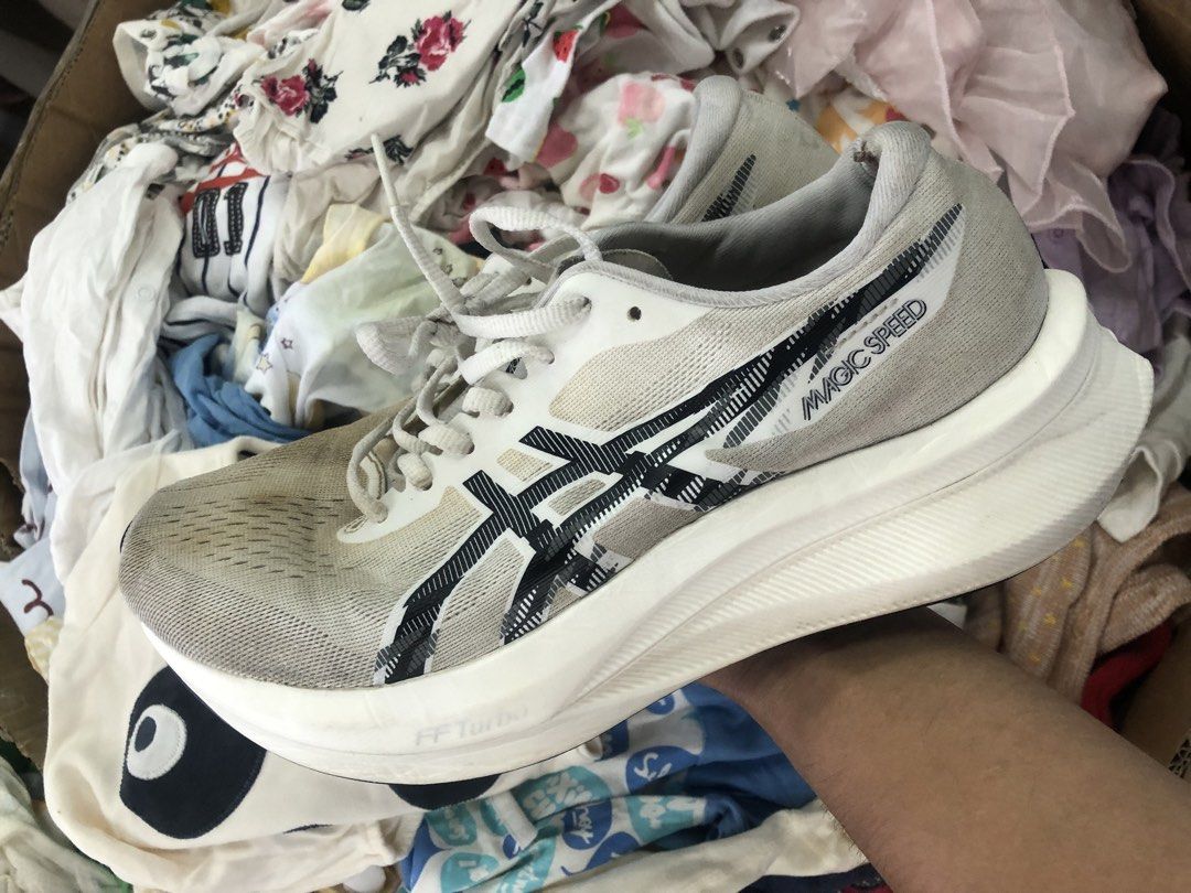 ASICS Magic Speed 4 Turbo Running Shoes (Category: Sneakers) located in Cavite. Submitted by thriftkicks3 (Listing ID 1464463501, Image 3). Description: - ASICS Magic Speed FF Turbo running shoes - Color: White and Black - Lightweight and responsive design - Features some signs of wear on mesh and soles - Plenty of life left for training or casual wear - Ideal for your next workout.