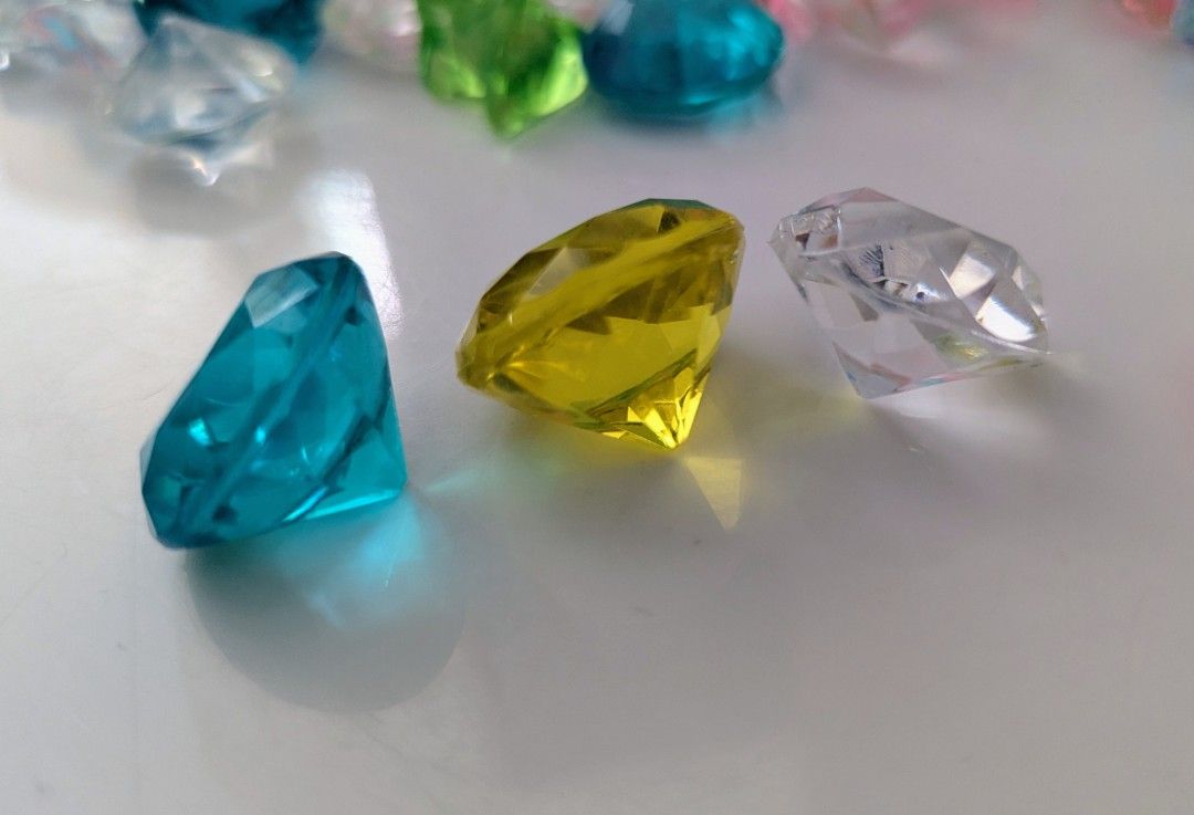 Assorted Acrylic Gems - Crafting & Decor (Category: Craft Supplies & Tools) located in Quezon City. Submitted by furbous (Listing ID 1464515537, Image 2). Description: - Colorful acrylic gems in diamond and heart shapes. - Available colors: pink, blue, green, clear, and yellow. - Ideal for DIY crafts, party decorations, and vase fillers. - Adds sparkle and charm to any project. - Generous amount for your creative needs. - perfect for sensory bins