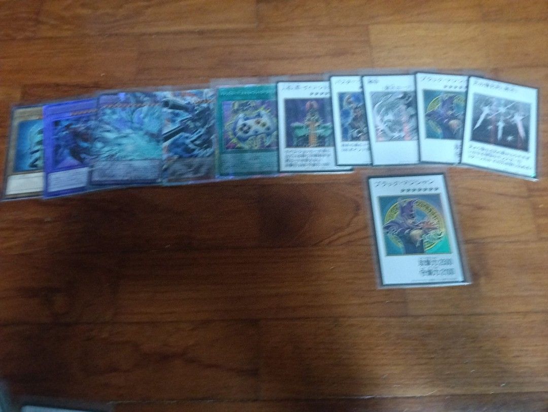Assorted characters (Category: Raw Cards) located in Singapore. Submitted by nikonyk (Listing ID 1464401607, Image 1). Description: ygo original artwork collection. dark magician colored non sec at the btm the top row all secrets. the black luster soldier and magician of chaos fusion is ultimate rare. cannon dragon is prismatic over frame blue eyes ultimate over frame normal. prismatic controller. pm me for prices..
