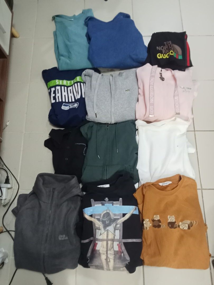 Assorted Hoodies and T-shirts Bundle (Category: Coats, Jackets and Outerwear) located in Manila. Submitted by kitkathrift (Listing ID 1464485864, Image 1). Description: -For Take only - Bundle of hoodies and t-shirts - Includes brands: Seattle Seahawks, Lacoste, Jack Wolfskin, and more - Great mix of casual tops for everyday wear - Features graphic tees and plain hoodies.