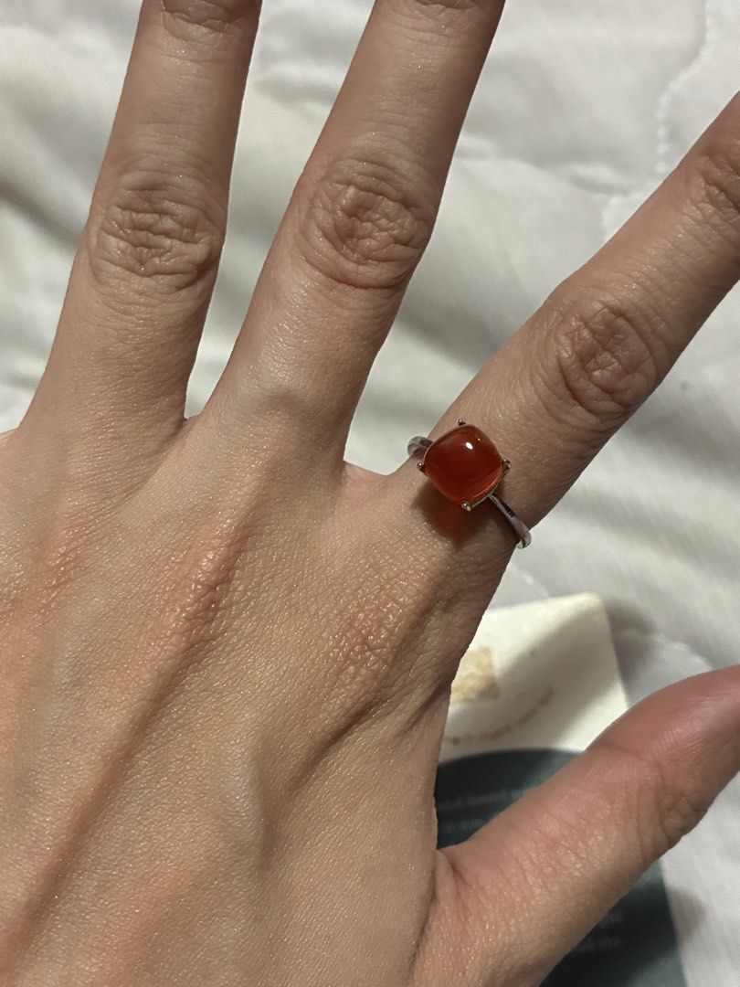 Astralzone Adjustable Ring with Carnelian Stone (Category: Rings) located in Cainta. Submitted by thingsfromerika (Listing ID 1464500661, Image 1). Description: - Adjustable ring with a beautiful orange-red stone. - Cushion-cut stone set in silver-toned metal. - Brand: Astralzone PH. - Comes with a crystal message card. - Perfect for adding a pop of color to your outfit. - silver .