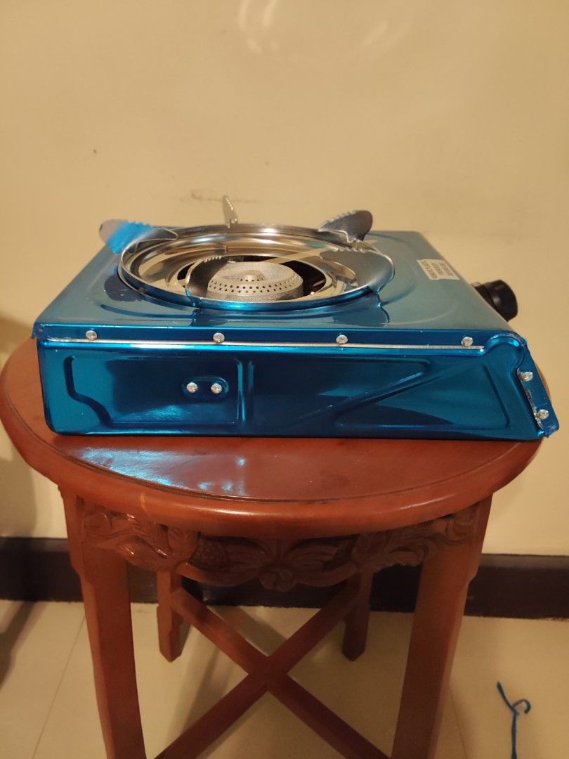 Astron GS-188 Automatic Ignition Gas Stove (Category: Cookers) located in Quezon City. Submitted by mar13.ana.13 (Listing ID 1464413278, Image 3). Description: - Astron GS-188 Portable Gas Stove - Stylish Blue Metallic Finish - Automatic Ignition with Flame Controller - Ideal for Camping and Small Kitchens - Includes Instruction Manual and Small Parts.