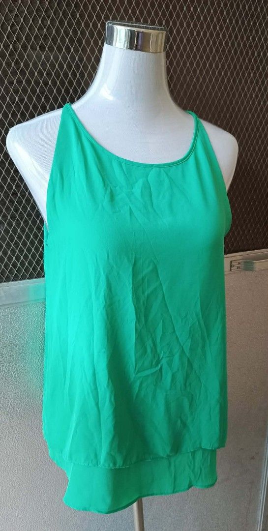 Audrey & Celine Green Sleeveless Top Size M (Category: Sleeveless) located in Cebu City. Submitted by violacloset (Listing ID 1464408057, Image 2). Description: Measurements: length: 27 bust: 20.