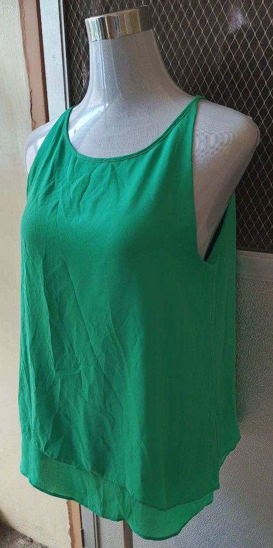 Audrey & Celine Green Sleeveless Top Size M (Category: Sleeveless) located in Cebu City. Submitted by violacloset (Listing ID 1464408057, Image 3). Description: Measurements: length: 27 bust: 20.