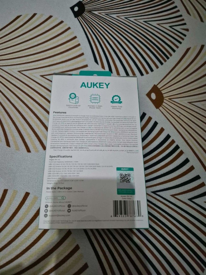 Aukey Power Bank 20,000 (Category: Other Gadgets) located in Quezon City. Submitted by iamghen21 (Listing ID 1464521869, Image 3). Description: Aukey PB-Y43 Sprint X 20K 65W 20000mAh Portable Power Bank with PD3.0 Technical SpecificationsModel: PB-Y43 (Sprint X Series)Battery Capacity: 20,000mAh / 74WhBattery Type: Lithium-PolymerTotal Ports: 3 (2 × USB-C + 1 × USB-A)Dimensions: 156 × 73 × 25 mmWeight: 390 grams Key FeaturesSmart Digital Display: