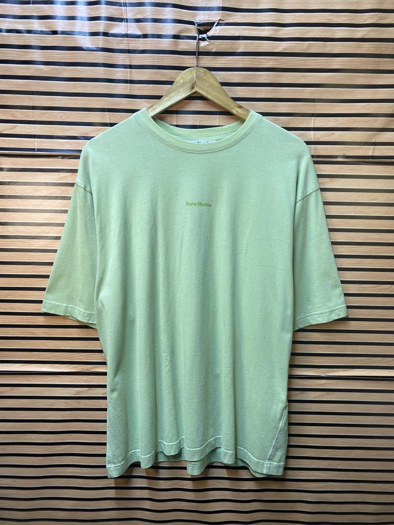 AUTHENTIC ACNE STUDIOS TEE (Category: Tshirts & Polo Shirts ) located in Makati City. Submitted by drip.poww (Listing ID 1464534184, Image 1). Description: - Light Green, short-sleeved - Size: XL - Dimes: 24x28 - Authentic - Excellent condition - Need wash, fresh from bale.