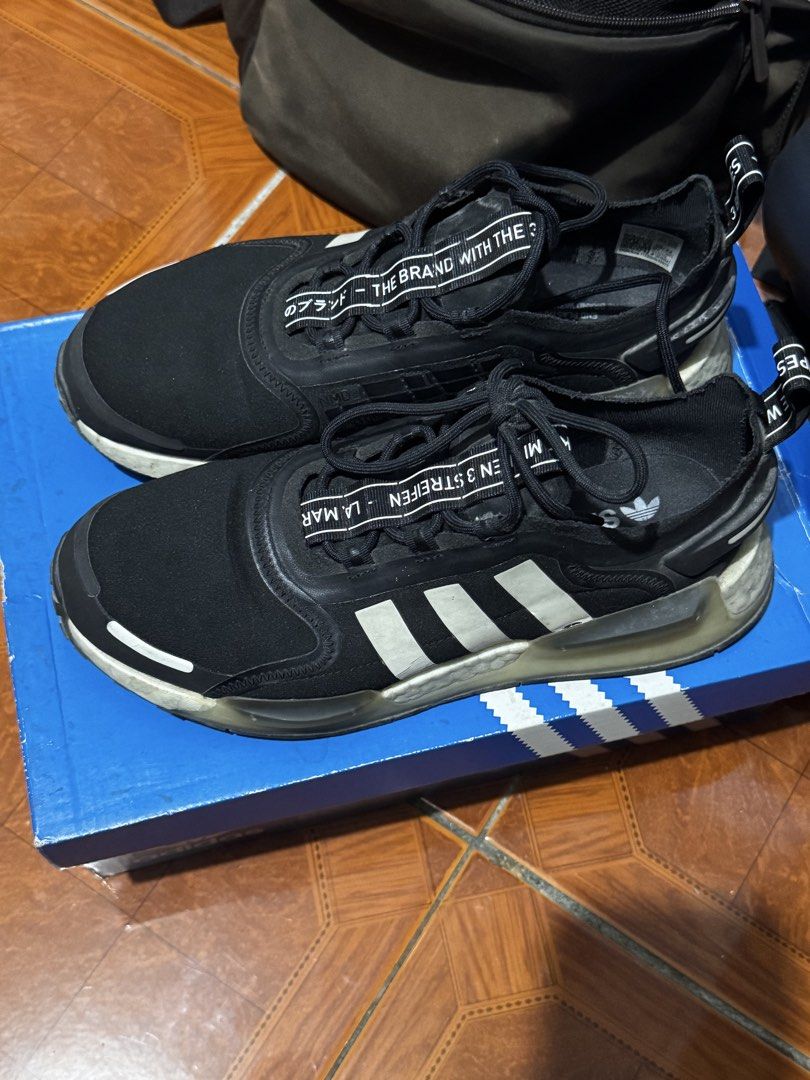 Authentic Adidas NMD V3 / CBLACK/FTWWHT (Category: Casual Shoes) located in Pasig City. Submitted by sdpii (Listing ID 1464480889, Image 1). Description: - Authentic adidas NMD V3 - Size: US 7 1/2, UK7, J255, CHN250 - With box - RFS: di na nagagamit - Pick up in Manila or meet up in Megamall - Slightly negotiable - With free shoe case (plastic).