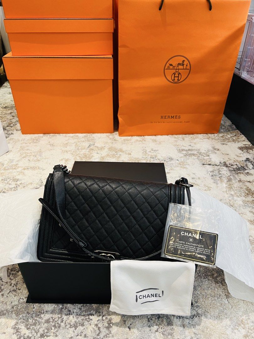 AUTHENTIC CHANEL CAVIAR LE BOY NEW MEDIUM | LIKE NEW (Category: Luxury Bags & Wallets) located in Cavite. Submitted by charmscloset888 (Listing ID 1464567407, Image 2). Description: Chanel le boy like new with plastic cover pa ibang hardwares (Includes box, dustbag, authenticity card and authenticity certificate from legit grails .