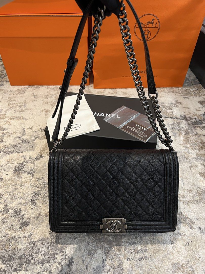 AUTHENTIC CHANEL CAVIAR LE BOY NEW MEDIUM | LIKE NEW (Category: Luxury Bags & Wallets) located in Cavite. Submitted by charmscloset888 (Listing ID 1464567407, Image 1). Description: Chanel le boy like new with plastic cover pa ibang hardwares (Includes box, dustbag, authenticity card and authenticity certificate from legit grails .