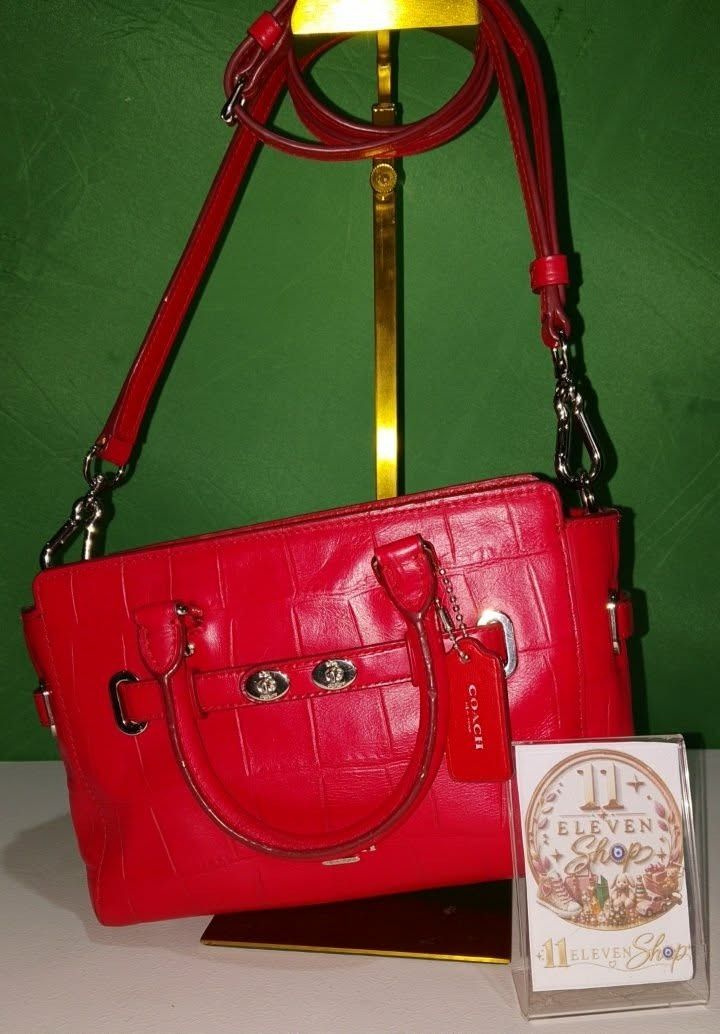 Coach Red Croc Embossed Leather 2-way Bag (Category: Luxury Bags & Wallets) located in Caloocan City. Submitted by 11eleven.shop (Listing ID 1464531596, Image 1). Description: - Authentic Red Blake Carryall 25 Leather Bright Red - Luxurious Croc Embossed Leather - Top Handles & Detachable Crossbody Strap - Includes Original Coach Hangtag - Issue: Usual creed peeling. Very minimal rubs as seen emphasized on picture but not too visible upon inspect