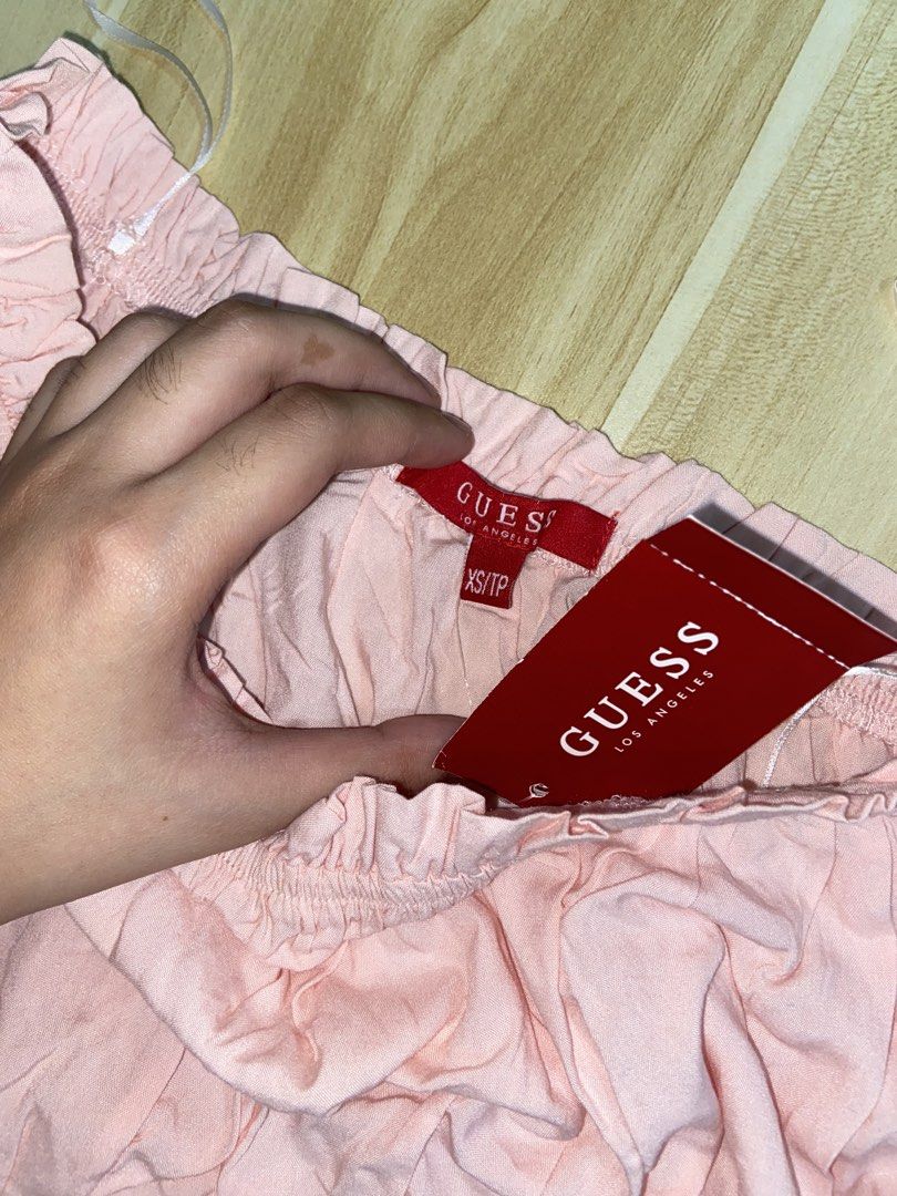 GUESS Authentic Camila Off- Shoulder Top (Category: Longsleeves) located in Guinobatan. Submitted by jadieee_young22 (Listing ID 1464402482, Image 2). Description: - never used - quality still very nice and brandnew! - 100% authentic! with Guess tag - bought from canada 🇨🇦 - fits XS as seen in the 2nd picture - long sleeves - color: dolly pink-rose - check the last pictures to see the full view top Rfs: cleaning out unused wardrobe items.