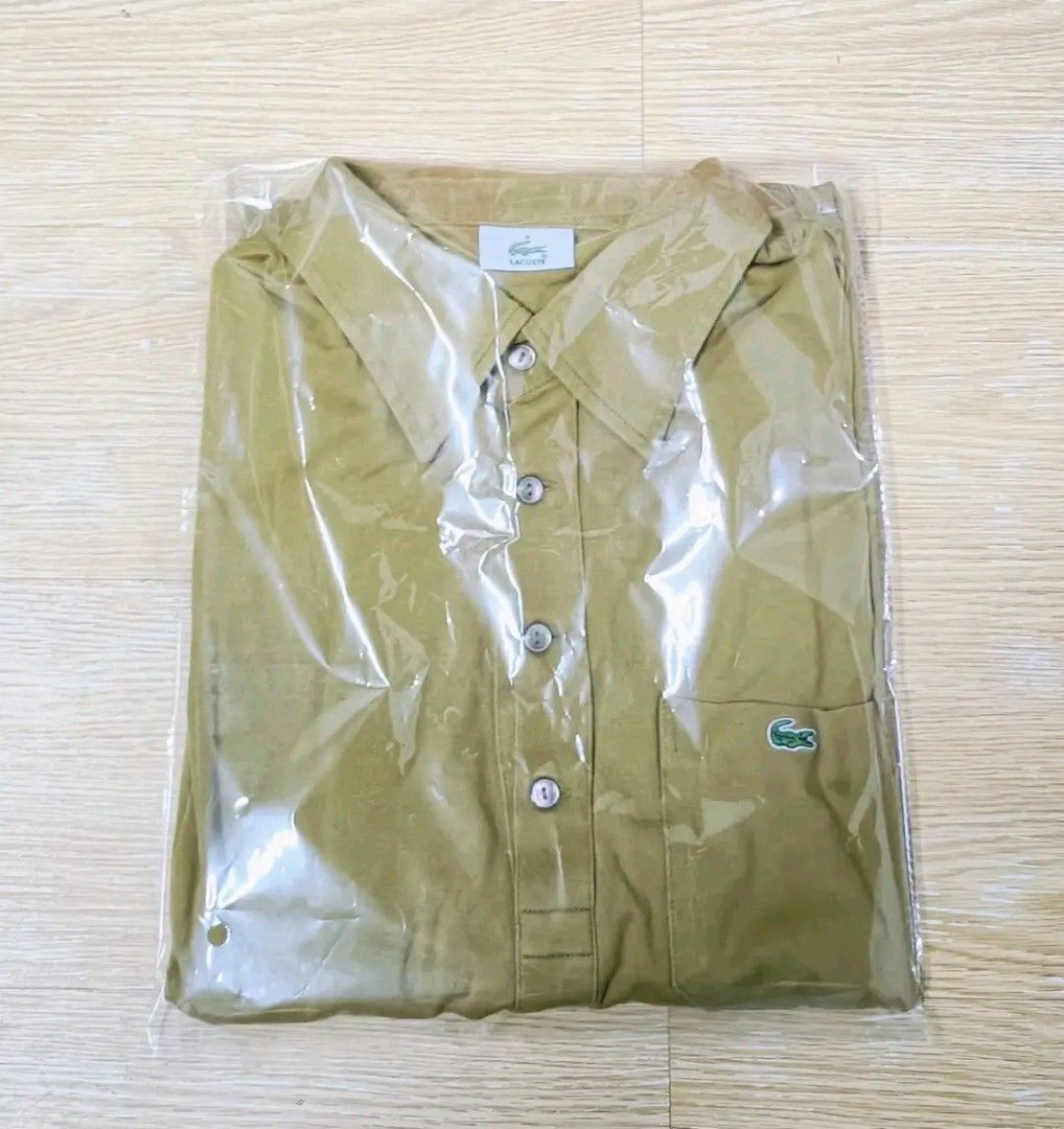 AUTHENTIC Lacoste long sleeve polo shirt (Category: Tshirts & Polo Shirts ) located in Manila. Submitted by bvnnie (Listing ID 1464489244, Image 3). Description: AUTHENTIC Lacoste long sleeve polo shirt Actual size using inches Armpit to Armpit/Widht 29 Lenght/ 28.5 fittings is Large Excellent Condition No issues Message if you have any other question about sizing. We do shipping nation wide I'm also A open for video call so that you can see the 