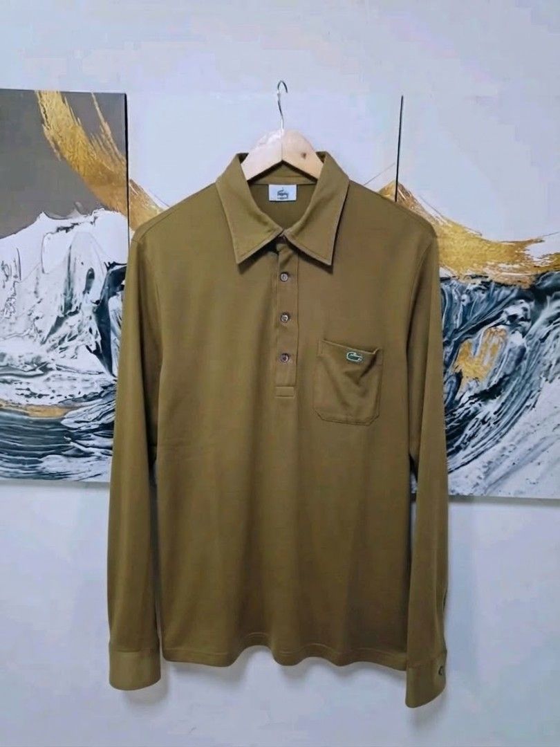 AUTHENTIC Lacoste long sleeve polo shirt (Category: Tshirts & Polo Shirts ) located in Manila. Submitted by bvnnie (Listing ID 1464489244, Image 2). Description: AUTHENTIC Lacoste long sleeve polo shirt Actual size using inches Armpit to Armpit/Widht 29 Lenght/ 28.5 fittings is Large Excellent Condition No issues Message if you have any other question about sizing. We do shipping nation wide I'm also A open for video call so that you can see the 