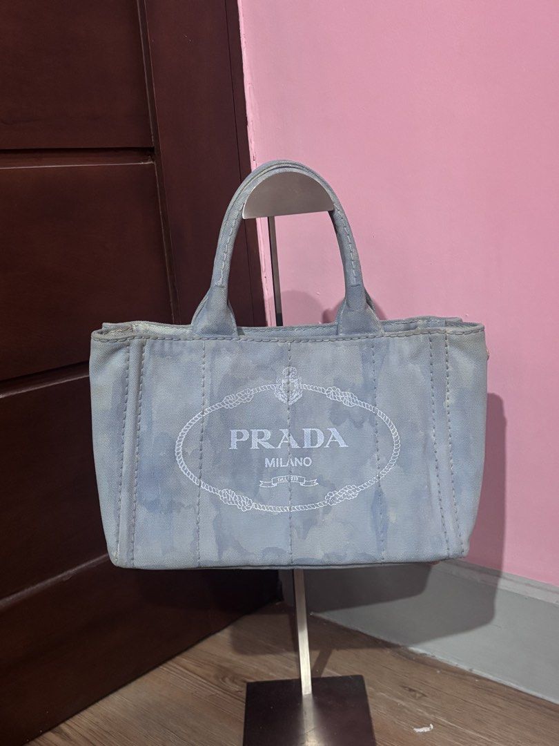 AUTHENTIC Prada Canapa (Category: Luxury Bags & Wallets) located in Baliuag. Submitted by shoppethrift (Listing ID 1464483848, Image 1). Description: -Guaranteed authentic - white tag coded - lampo zip - small size - paint is faded selling low.