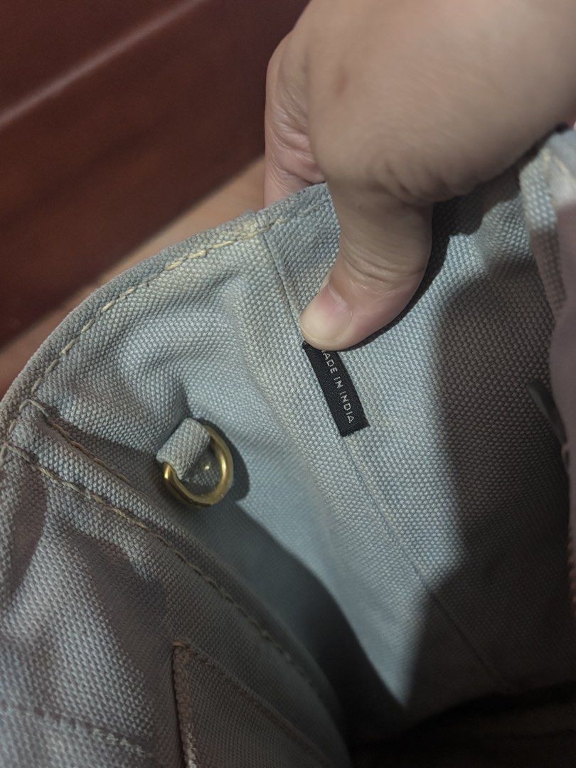 AUTHENTIC Prada Canapa (Category: Luxury Bags & Wallets) located in Baliuag. Submitted by shoppethrift (Listing ID 1464483848, Image 3). Description: -Guaranteed authentic - white tag coded - lampo zip - small size - paint is faded selling low.