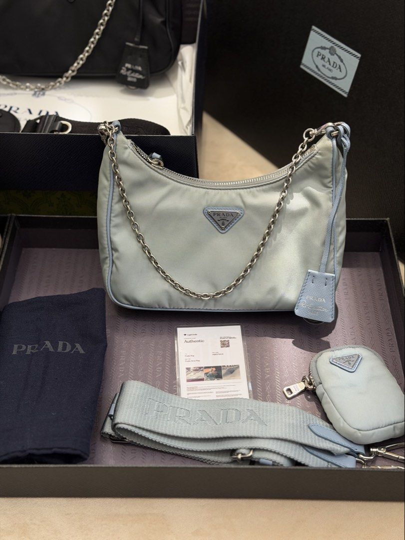 Authentic Prada Re-edition 2005 Multipochette in Sky blue (Category: Cross-body Bags) located in Manila. Submitted by maria_2326 (Listing ID 1464483101, Image 1). Description: Prada Re-edition Multipochette in Skyblue 💯% Authentic Inclusions: Box, dust bag, guitar strap, chain sling, clochette, coin pouch, COA No lowballing! Location: Manila/QC.