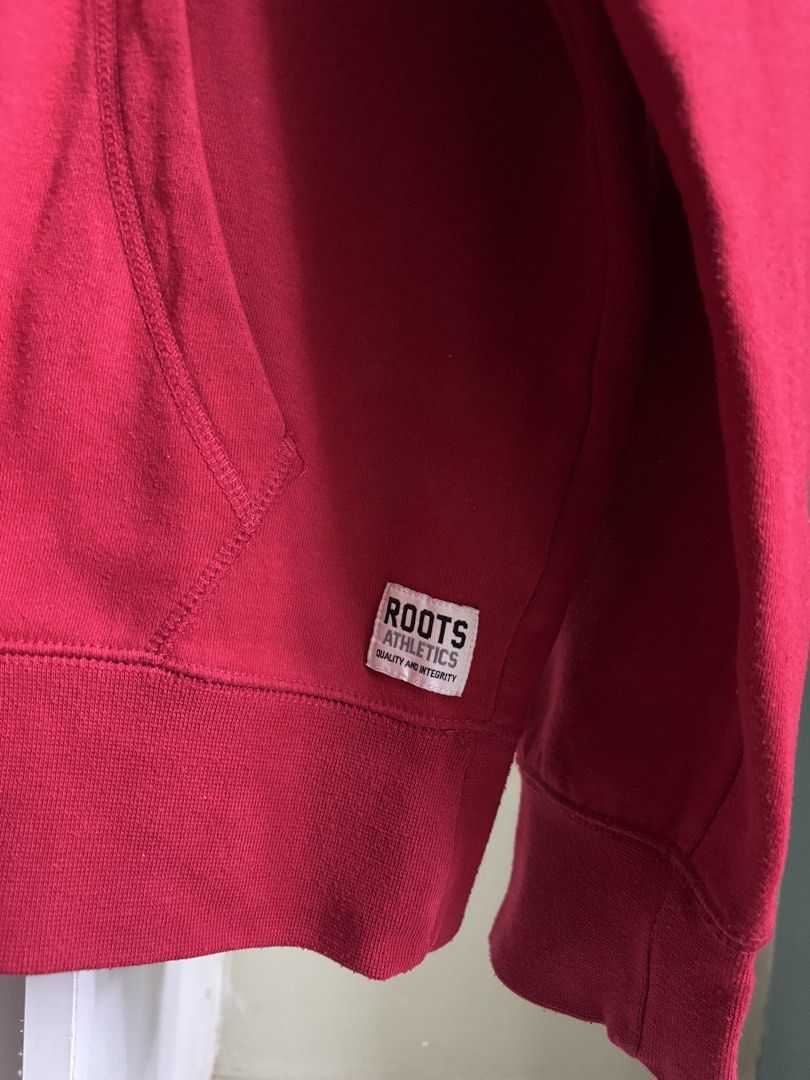 Authentic Roots Canada Red Pullover Hoodie (Category: Coats, Jackets and Outerwear) located in Quezon City. Submitted by saveproject (Listing ID 1464403386, Image 3). Description: Classic Roots Fleece Pullover Hoodie, in excellent condition. Medium size. .