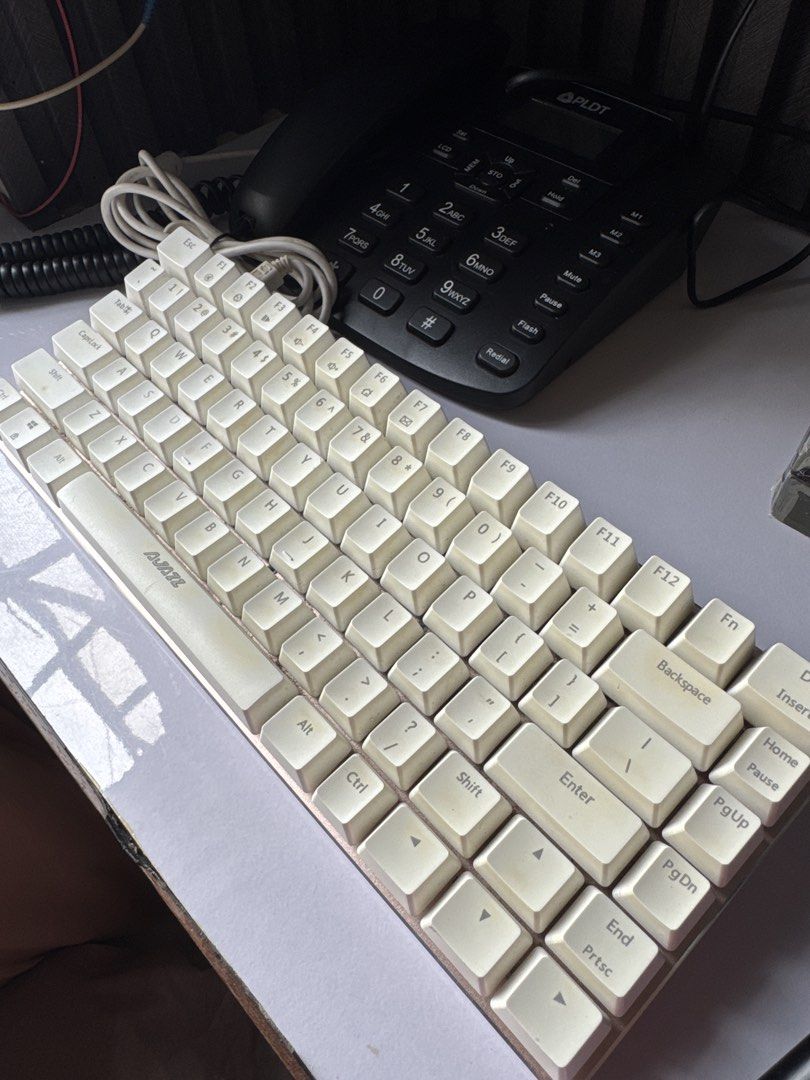AVAZZ White Mechanical Keyboard (Category: Computer Keyboard) located in Muntinlupa City. Submitted by Tins_preloved (Listing ID 1464379262, Image 1). Description: - AVAzz White Mechanical Keyboard - Compact layout with function keys - Wired connection - Minor signs of use on keycaps - Ideal for typing and gaming.
