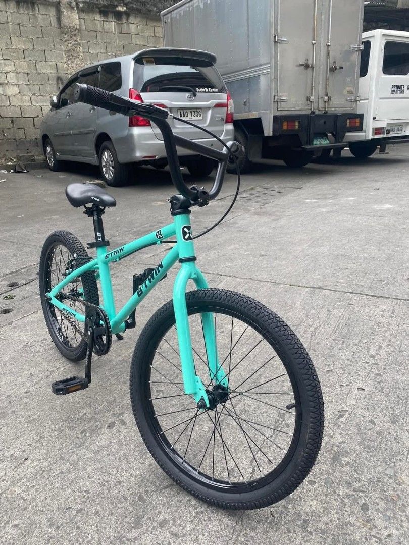B twin size 20 (Category: Bicycles) located in Manila. Submitted by minidivisoria (Listing ID 1464416061, Image 1). Description: add 150 if assemble New B'Twin 20 Inch Specs:Wheel Size: 20 inches Frame Material: Hi-Ten steelFork Material: Hi-Ten steel Brakes: V-brakes Number of Speeds: Single-speedIntended Use: BMX freestyle Sizing:Rider Height: 4'10" - 5'6" (147 - 168 cm)Top Tube Length: 20.5".