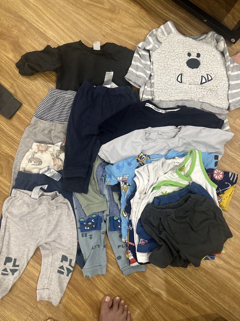Baby Boy Clothes Bundle - Tops, Pants, Shorts (Category: Babies & Kids Fashion) located in Cavite. Submitted by BagsNTags (Listing ID 1464514168, Image 1). Description: - Bundle of baby boy clothes -good for pambahay - Includes long-sleeved tops, pants, and shorts - Features cute prints like bears and cartoon characters - Perfect for everyday wear -total of 25pcs.