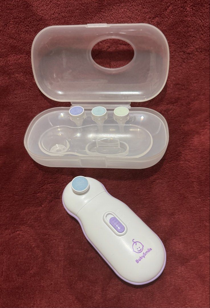 BabySmile Electric Nail File (Category: Hands & Nails) located in La Trinidad. Submitted by whatnotcollections (Listing ID 1464439135, Image 2). Description: Keep your baby’s nails neatly trimmed with the BabySmile Electric Nail File. Designed for delicate fingers, this electric nail file offers a gentle and safe trimming experience, reducing the risk of accidental scratches. With a quiet motor, an ergonomic design, and multiple filing pads for d