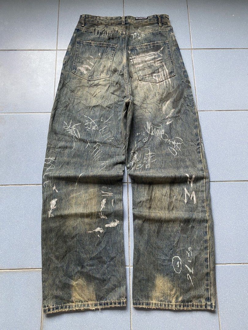 BALENCIAGA GRAFFITI (Category: Jeans) located in Cabuyao City. Submitted by badthrift_pat (Listing ID 1464417495, Image 2). Description: BALENCIAGA GRAFFITI 👖WAIST:34 👖LENGTH:49.5 👖THIGH:14.5 👖HEM:11 FLAWS:MINIMAL HILL DRAG 🏷️:1.999.