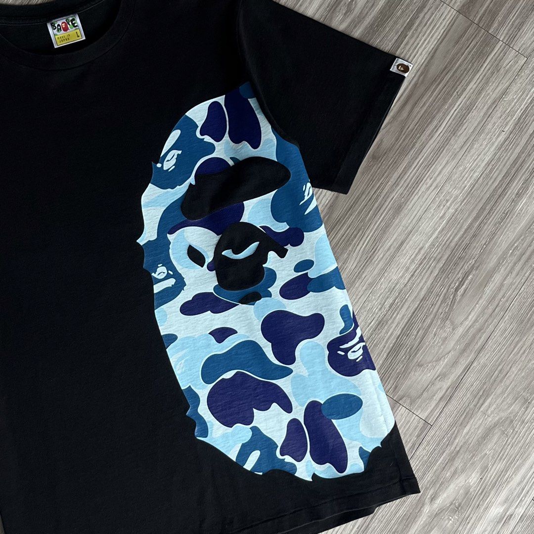 Bape OG ABC Camo Side Big Head T-Shirt (Category: Tshirts & Polo Shirts ) located in Cebu City. Submitted by specializedgoodsitem_ (Listing ID 1464537579, Image 3). Description: excellent condition see very minimal flaw last pic slightly needs wash ( naka display sa store ) details posted color may vary due to light 21.5’ width 29’ length .