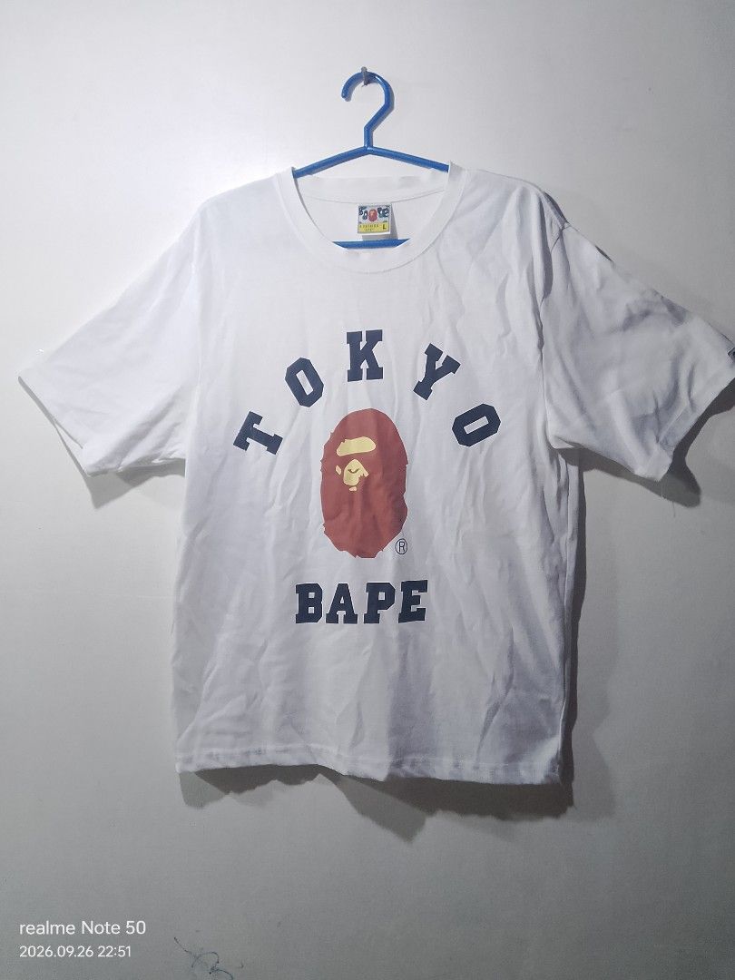 Bape tshirt (Category: Tshirts & Polo Shirts ) located in San Ildefonso. Submitted by cristopherthrifts (Listing ID 1464466932, Image 1). Description: -Bape t shirt -Size L on tags W18 L24 -with iconic big logo on front -with back print of bape head -can used for casual wear.