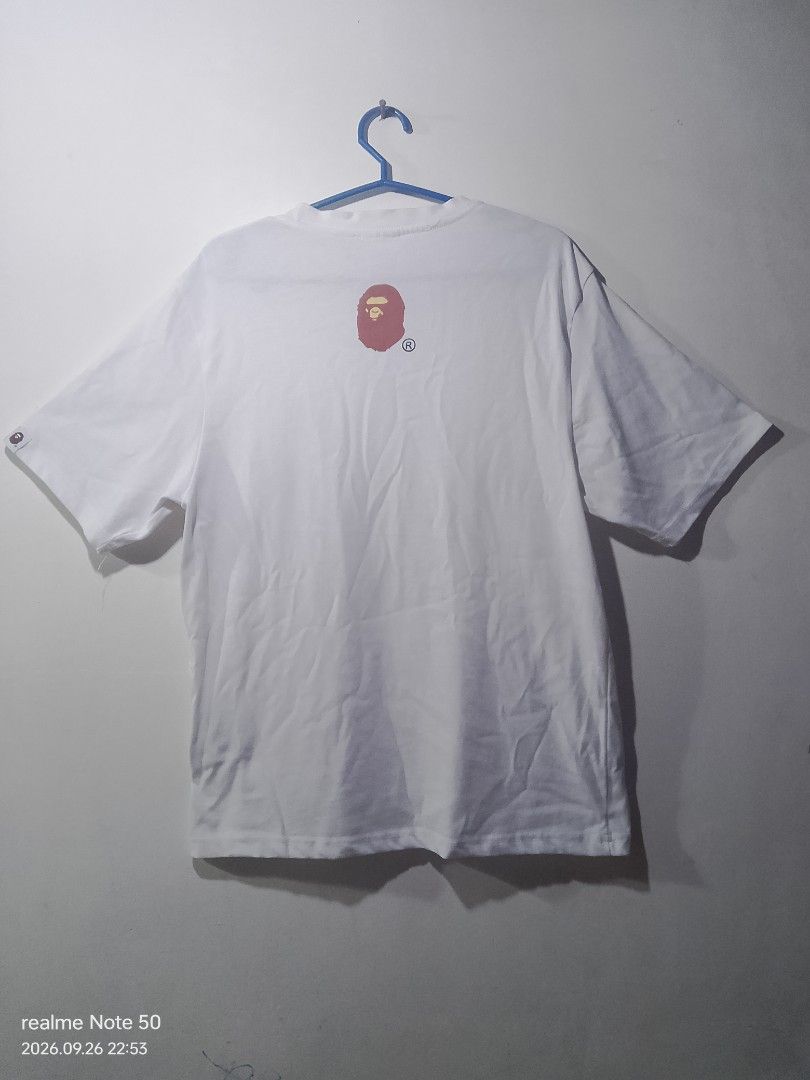 Bape tshirt (Category: Tshirts & Polo Shirts ) located in San Ildefonso. Submitted by cristopherthrifts (Listing ID 1464466932, Image 2). Description: -Bape t shirt -Size L on tags W18 L24 -with iconic big logo on front -with back print of bape head -can used for casual wear.