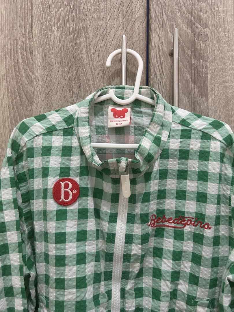 Bebe de Pino Green Gingham Jacket (Category: Babies & Kids Fashion) located in Makati City. Submitted by michellecollado07 (Listing ID 1464404541, Image 2). Description: - Cute green gingham jacket from Bebe Pipo - Zip-up front with pockets - Elasticated cuffs and hem - Lightweight material, ideal for layering - Perfect for casual wear Size: 4-5y .