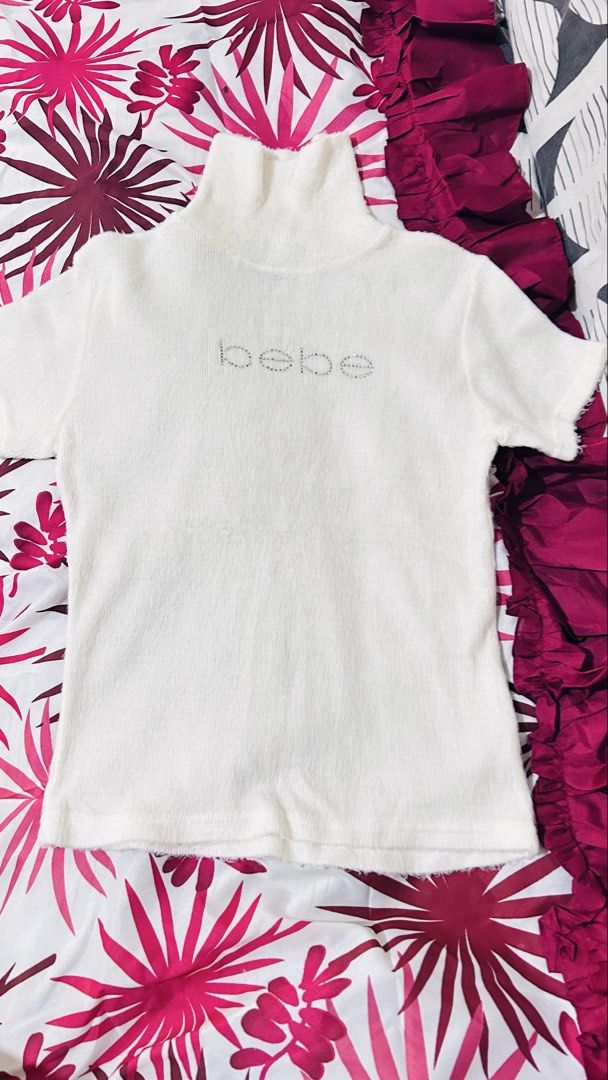 Bebe turtle neck top (Category: Shirts) located in Bauang. Submitted by alyssaaaamm (Listing ID 1464430976, Image 2). Description: Size s on tag stretch fabric Pa fur type .
