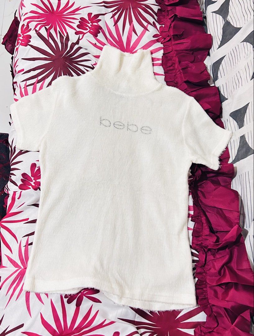 Bebe turtle neck top (Category: Shirts) located in Bauang. Submitted by alyssaaaamm (Listing ID 1464430976, Image 1). Description: Size s on tag stretch fabric Pa fur type .