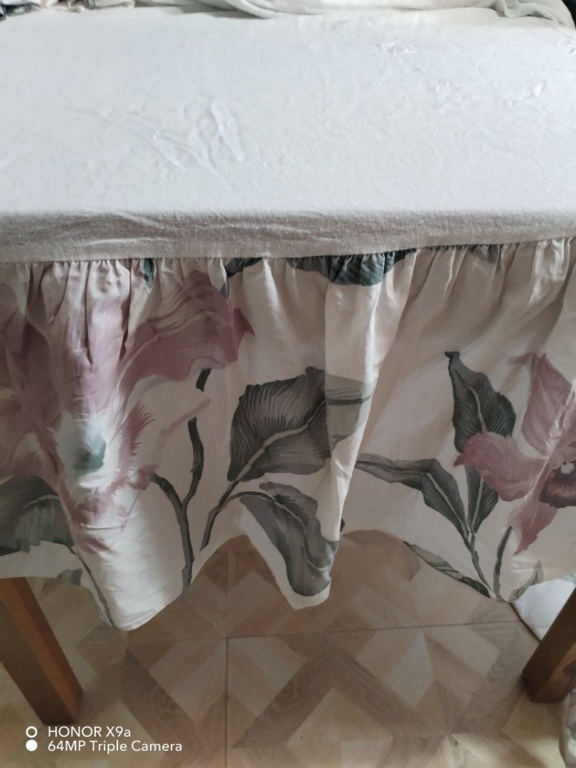 Bed skirt ( 54 x 84 inches) (Category: Bedding & Towels) located in Muntinlupa City. Submitted by arciagamaryann68 (Listing ID 1464460002, Image 2). Description: - Bed skirt with a beautiful floral print - Dimensions: 54 x 84 inches - Features a ruffled design for a classic look - Soft pink and green floral pattern - Enhances bedroom decor.