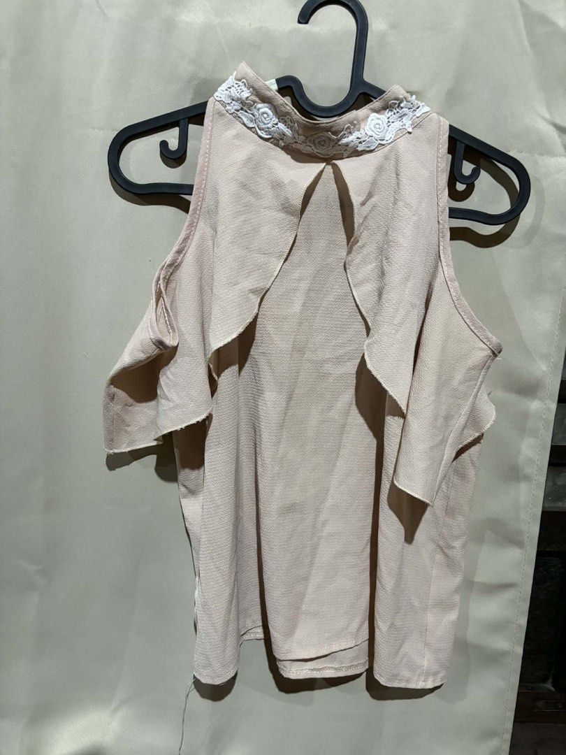 Beige Cold Shoulder Top with Lace Detail (Category: Sleeveless) located in Nagcarlan. Submitted by fiercewater-40fb (Listing ID 1464419795, Image 1). Description: - Cute beige top - Cold shoulder design - Ruffled layers on the front - Lace detail around the neckline - Perfect for casual or dressy occasions - Easy to pair with jeans or skirts.