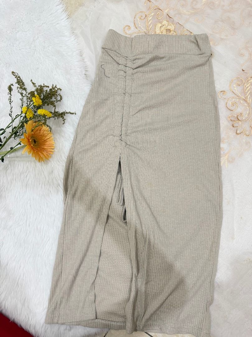 Beige Tie Long Skirt (Category: Skirts) located in Mandaluyong City. Submitted by prelovedbyrinoa_ (Listing ID 1464360523, Image 1). Description: • Long skirt 🤍 • Stylish & easy to pair • Perfect for casual or dressy looks • Preloved / gently used • Good condition.