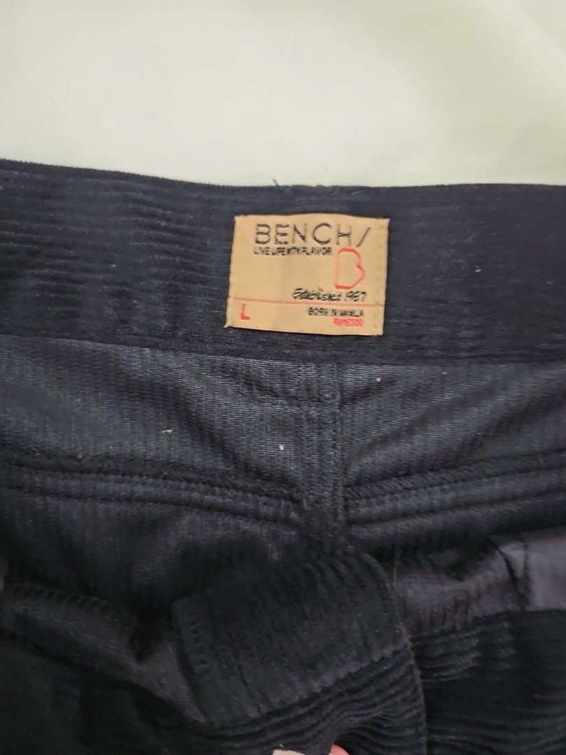 Bench Black Corduroy Mini Skirt (Category: Skirts) located in Muntinlupa City. Submitted by shoptitak (Listing ID 1464460282, Image 2). Description: - Black corduroy mini skirt - Four pockets - Textured fabric - Button and zip front closure - Versatile and easy to style.