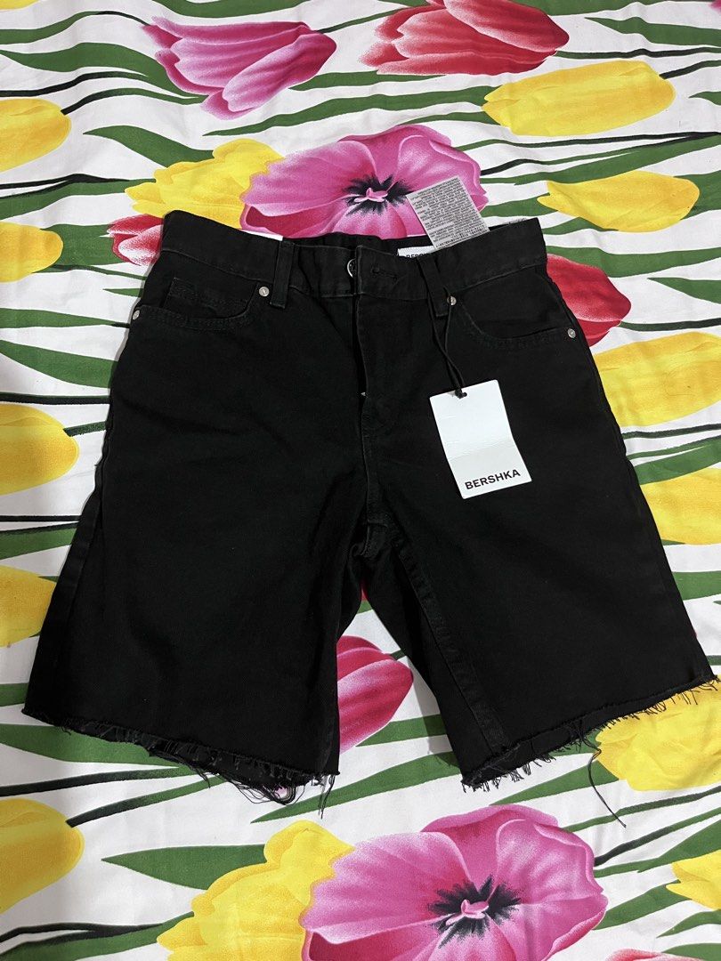 Bershka Black Denim Cut-Off Shorts Size 32 (Category: Shorts) located in Manila. Submitted by oddstorm_9d6c74 (Listing ID 1464456021, Image 1). Description: - Brand: Bershka - Color: Black - Material: Denim - Style: Classic five-pocket - Detail: Raw hem - Closure: Button and zip - Size: 32 - Occasion: Casual wear.